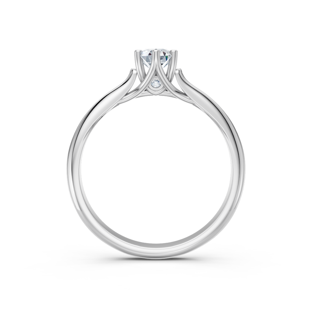 Zaročni prstan iz belega zlata Zlatarstvo Gajšek, elegantna obliko z briljantnim diamantom, prikazan na sliki.